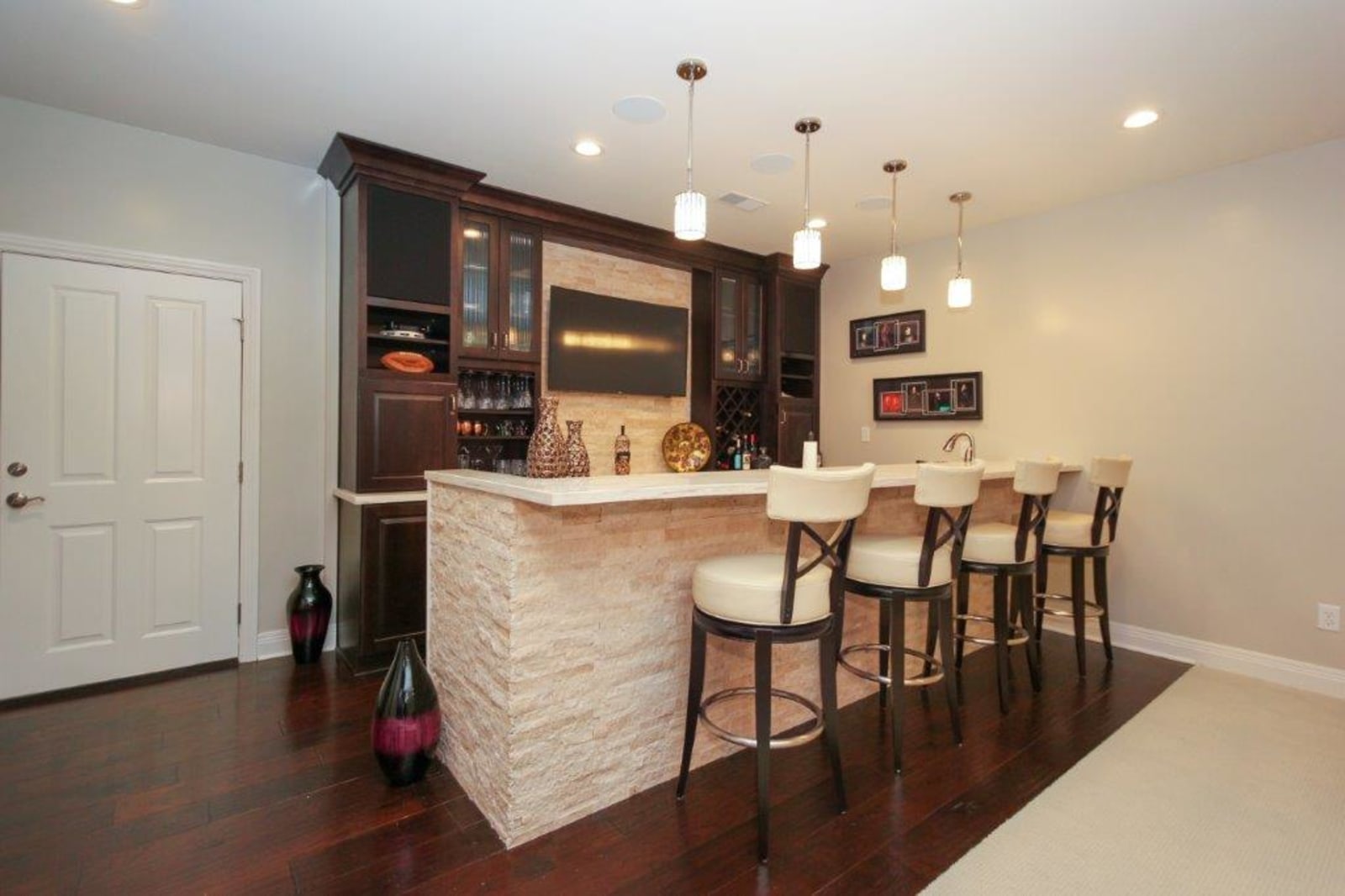 Detail of the bar cabinetry and open shelving