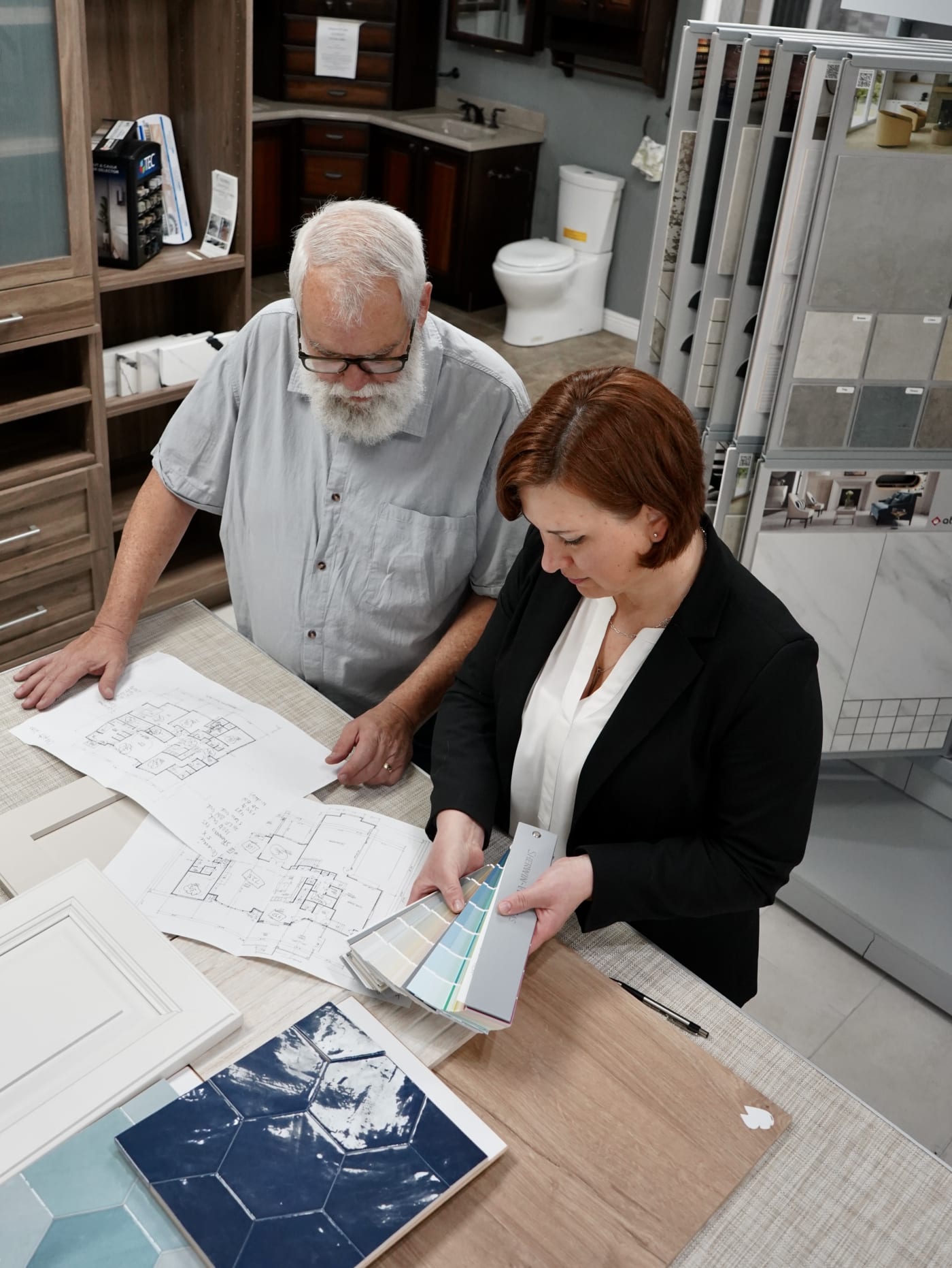 Drexel builder design team reviewing plans at the showroom